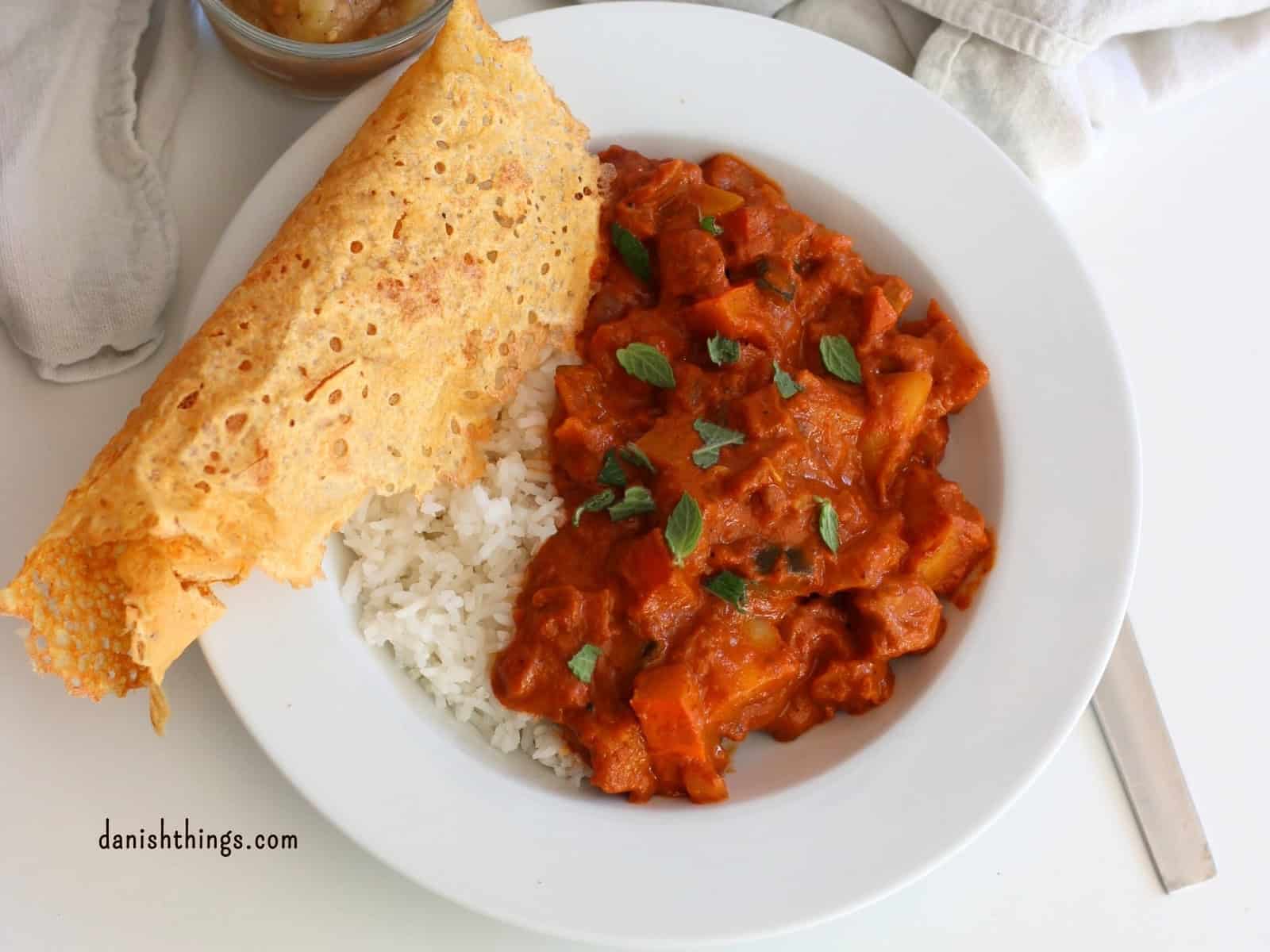 How to make seasonal potato curry - get the ultimate basic recipe Potato Curry with pumpkin and courgette - and mint on top, a little rice and a lentil and chickpea flour flatbread on the side