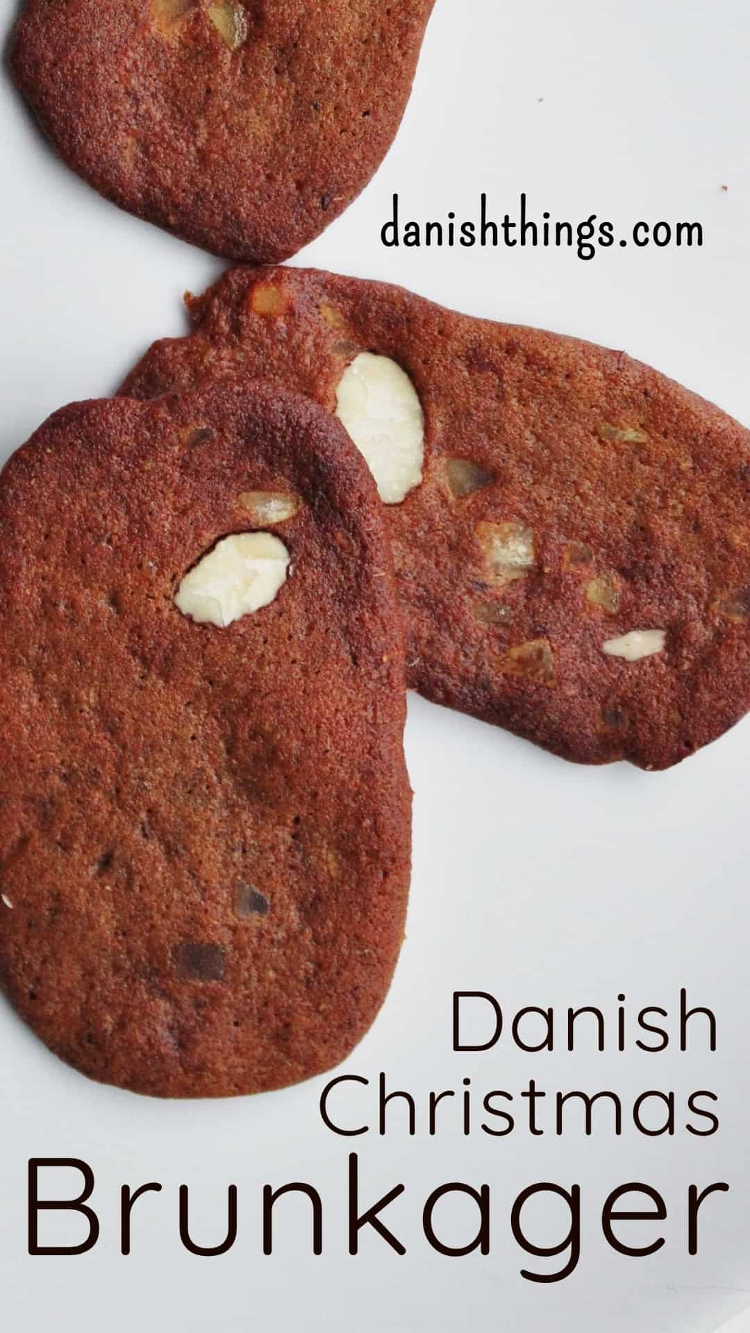 Brunkager - traditional spiced biscuits, the authentic taste of Danish Christmas Brunkager - authentic Danish brown spiced Christmas biscuits with almonds and candied peel. A classic for the Danish Christmas coffee table - or hygge with a glass of gløgg. Find recipes, print and inspiration throughout the year at danishthings.com © Christel Parby #DanishThings #cosy #Christmas #brunkager #classic #biscuits #Christmasbiscuits #cookies #ChristmasHygge #holidays