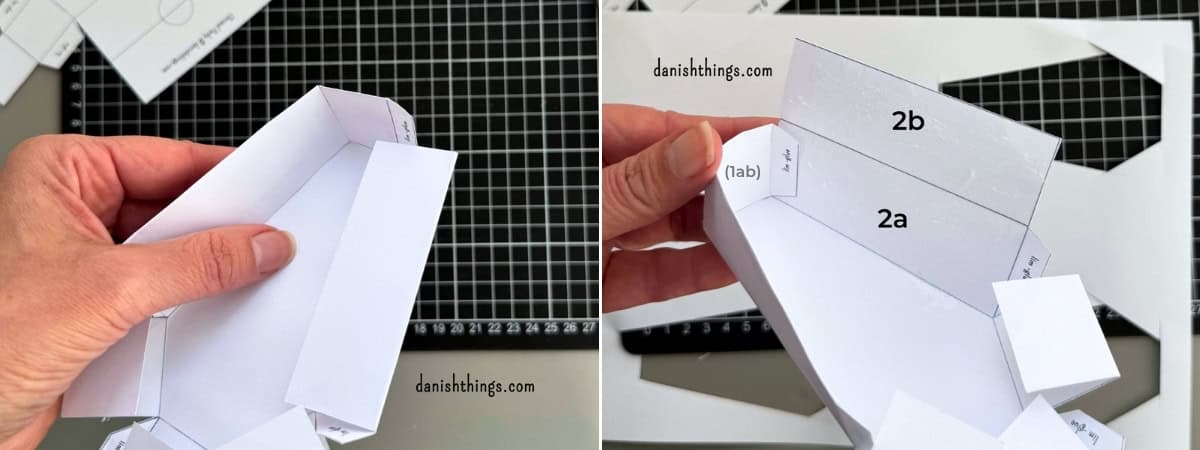 To nærbilleder viser samling af de dobbelte sidevægge på en hvid papirkiste. Papiret foldes ind over limflapperne, så hjørnerne bliver samlet.
© Christel Parby · danishthings.com · #DanishThings #Kistebund #FoldOgLim #HalloweenDIY